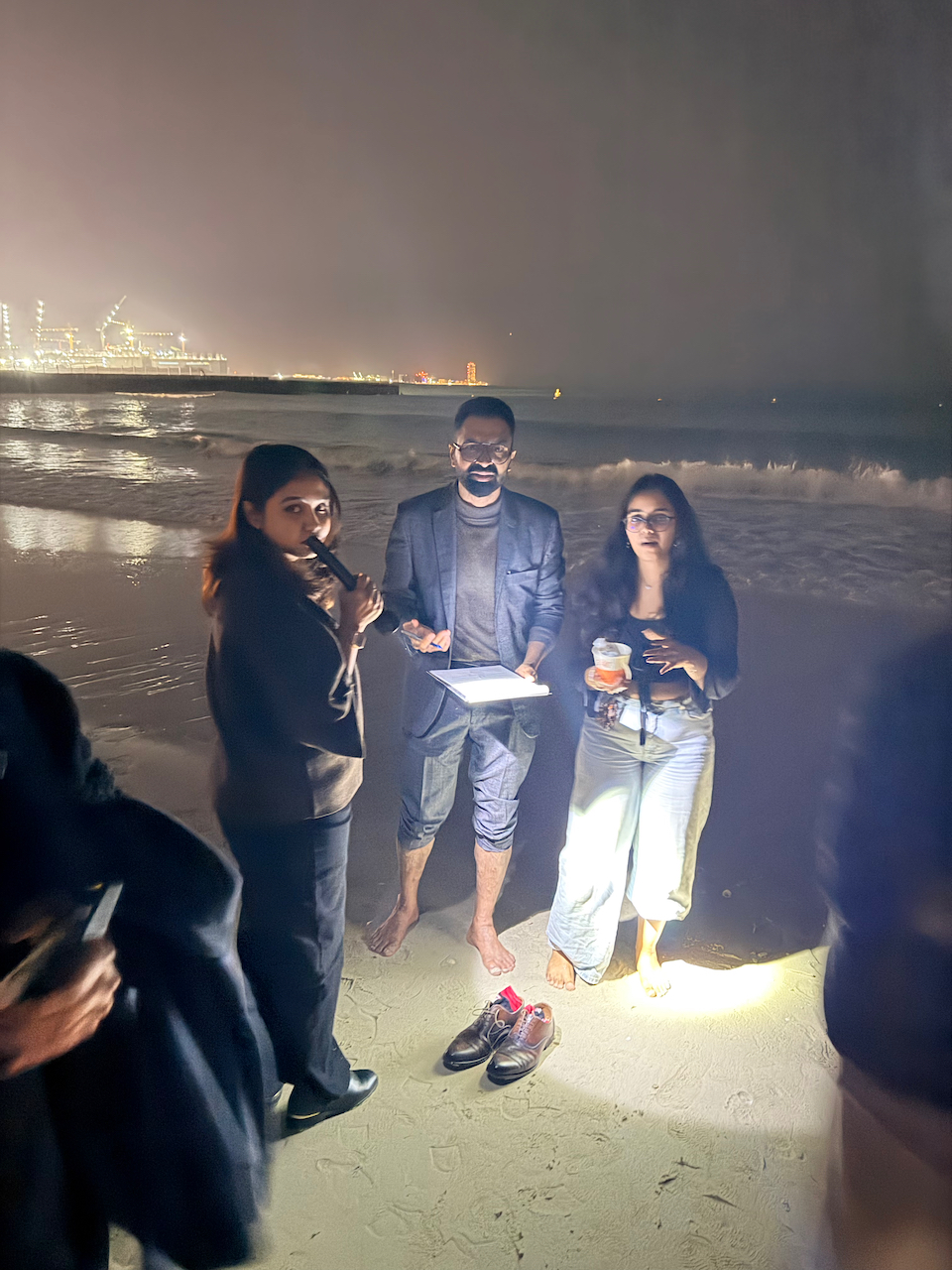 Citizen scientists collecting sediment cores at Jumeirah Beach