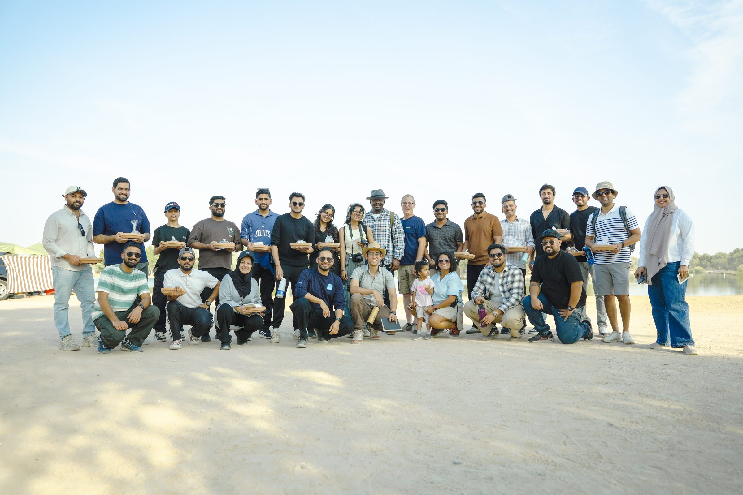 The Recall participants gathered for a group portrait at Al Qudra